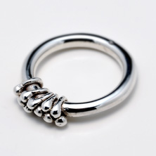Heavy silver ring with silver wire detail