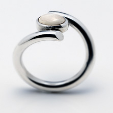 Oval mother of pearl stone set in a twist 