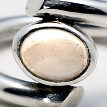 Oval mother of pearl stone set in a twist 