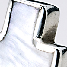 Mother of pearl cross on a silver band 