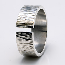 Textured ring in 'open' style with gold detail 