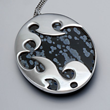 Snowflake Obsidian Set in a decorative and unusual setting 